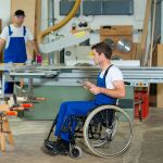 worker; factory; wheelchair; disabled; handicapped; rehabilitation; carpenter; construction; wood; workers; industrial; industry; white; carpentry; man; tool; work; workshop; professional; furniture; job; working; business; machine; building; occupation; 