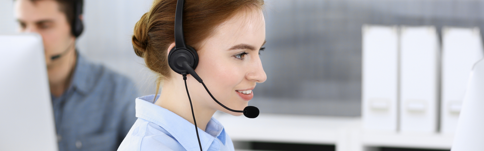 call center; call; operator; business; team; group; woman; happy; support; people; office; businesswoman; headphone; headset; smiling; microphone; work; executive; staff; help desk; working; telemarketing; consultant; teamwork; service; communication